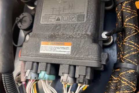 Heavy-equipment electrical components and diagnostic work — photo 3