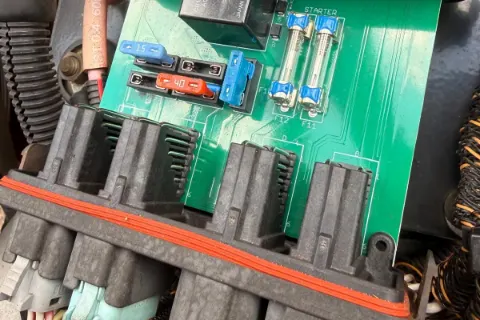 Heavy-equipment electrical components and diagnostic work — photo 4
