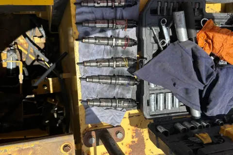 Heavy-equipment engine rebuild and troubleshooting work — photo 8