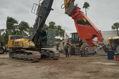 Hydraulic equipment and components being serviced — photo 1