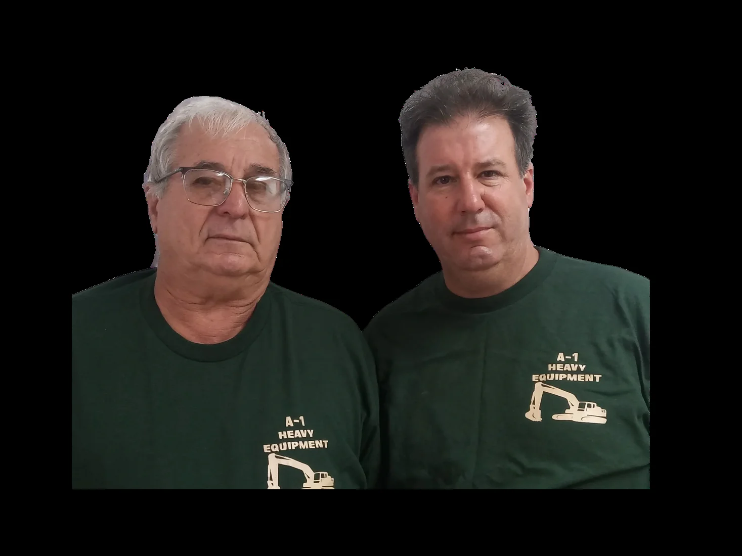 Two members of the A-1 team in green work shirts, from the existing company website